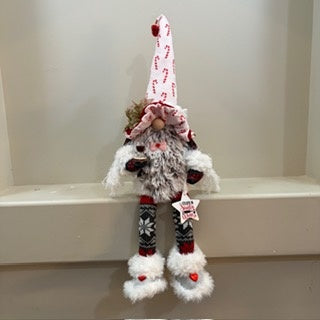 Christmas gnome with dangling legs